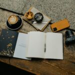 스트레스, 작은 생활 변화로 큰 평화 찾기 an open book sitting on top of a wooden table next to a cup of coffee